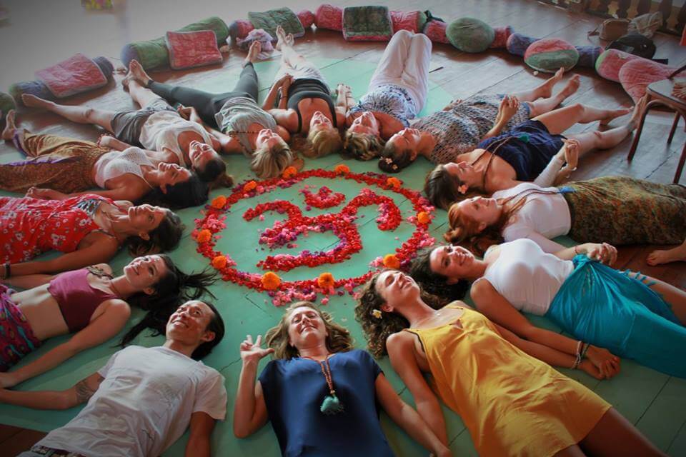 santosha yoga teacher training students lying in circle