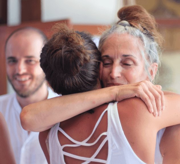 santosha yoga teachers hugging